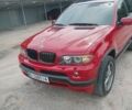 Красный БМВ 5 Серия, объемом двигателя 4.8 л и пробегом 299 тыс. км за 11990 $, фото 1 на Automoto.ua