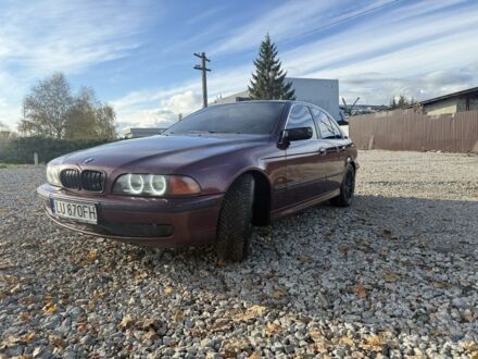 Красный БМВ 5 Серия, объемом двигателя 2.5 л и пробегом 450 тыс. км за 2799 $, фото 1 на Automoto.ua