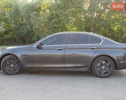 Серый БМВ 5 Серия, объемом двигателя 2 л и пробегом 175 тыс. км за 13350 $, фото 5 на Automoto.ua