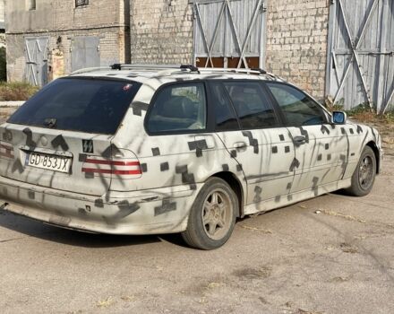 Серый БМВ 5 Серия, объемом двигателя 2.5 л и пробегом 450 тыс. км за 1850 $, фото 1 на Automoto.ua