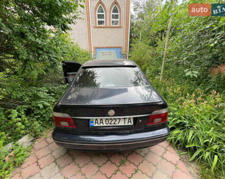 Синий БМВ 5 Серия, объемом двигателя 4.4 л и пробегом 357 тыс. км за 5250 $, фото 14 на Automoto.ua