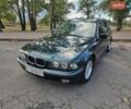 Зеленый БМВ 5 Серия, объемом двигателя 2.5 л и пробегом 413 тыс. км за 2700 $, фото 1 на Automoto.ua