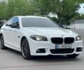 Белый БМВ 520, объемом двигателя 2 л и пробегом 124 тыс. км за 15000 $, фото 1 на Automoto.ua