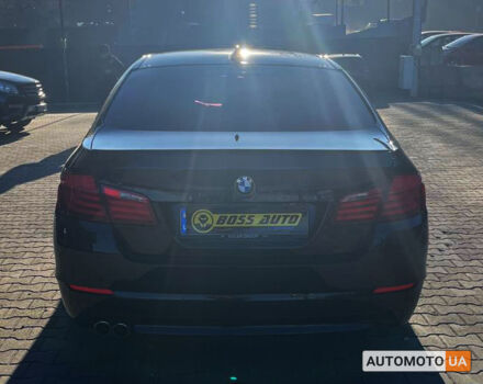 Чорний БМВ 520, об'ємом двигуна 2 л та пробігом 210 тис. км за 17600 $, фото 4 на Automoto.ua