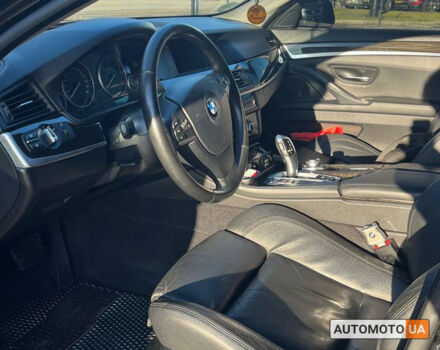 Чорний БМВ 520, об'ємом двигуна 2 л та пробігом 210 тис. км за 17600 $, фото 6 на Automoto.ua