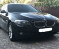 Чорний БМВ 520, об'ємом двигуна 2 л та пробігом 203 тис. км за 27400 $, фото 1 на Automoto.ua