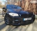 Чорний БМВ 520, об'ємом двигуна 2 л та пробігом 215 тис. км за 18950 $, фото 1 на Automoto.ua