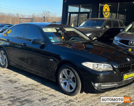 Черный БМВ 520, объемом двигателя 2 л и пробегом 210 тыс. км за 17600 $, фото 1 на Automoto.ua