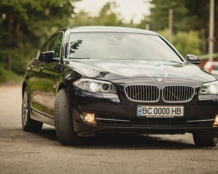 Чорний БМВ 520, об'ємом двигуна 2 л та пробігом 237 тис. км за 20600 $, фото 1 на Automoto.ua