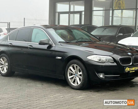 Черный БМВ 520, объемом двигателя 2 л и пробегом 282 тыс. км за 11999 $, фото 1 на Automoto.ua