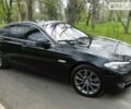 Чорний БМВ 520, об'ємом двигуна 2 л та пробігом 143 тис. км за 27600 $, фото 1 на Automoto.ua