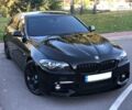 Чорний БМВ 520, об'ємом двигуна 2 л та пробігом 79 тис. км за 27500 $, фото 1 на Automoto.ua