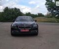 Чорний БМВ 520, об'ємом двигуна 2 л та пробігом 150 тис. км за 31000 $, фото 1 на Automoto.ua