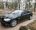 Чорний БМВ 525, об'ємом двигуна 2 л та пробігом 242 тис. км за 21000 $, фото 1 на Automoto.ua