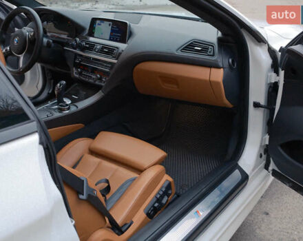 Белый БМВ 6 Серия, объемом двигателя 4.4 л и пробегом 75 тыс. км за 32000 $, фото 5 на Automoto.ua