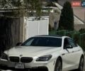 Белый БМВ 6 Серия, объемом двигателя 4.4 л и пробегом 84 тыс. км за 35000 $, фото 1 на Automoto.ua