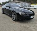 Черный БМВ 6 Серия, объемом двигателя 4.4 л и пробегом 145 тыс. км за 8300 $, фото 1 на Automoto.ua