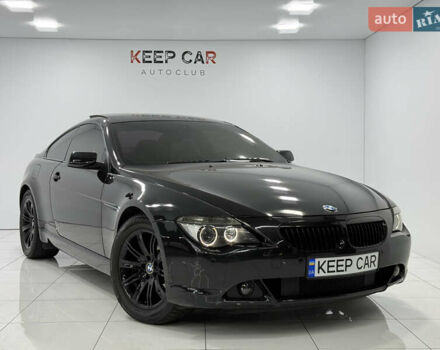 Черный БМВ 6 Серия, объемом двигателя 4.4 л и пробегом 130 тыс. км за 11000 $, фото 1 на Automoto.ua