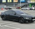 Черный БМВ 6 Серия, объемом двигателя 4.4 л и пробегом 105 тыс. км за 12800 $, фото 1 на Automoto.ua