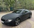 Черный БМВ 6 Серия, объемом двигателя 4.4 л и пробегом 144 тыс. км за 8500 $, фото 1 на Automoto.ua