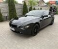Черный БМВ 6 Серия, объемом двигателя 3 л и пробегом 266 тыс. км за 8900 $, фото 1 на Automoto.ua