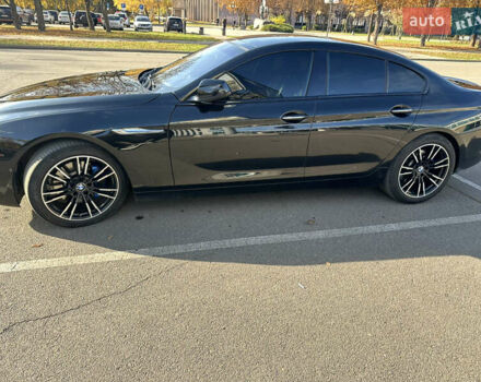 Черный БМВ 6 Серия, объемом двигателя 2.98 л и пробегом 170 тыс. км за 17000 $, фото 2 на Automoto.ua