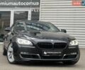 Чорний БМВ 6 Серія, об'ємом двигуна 2.98 л та пробігом 175 тис. км за 19900 $, фото 1 на Automoto.ua