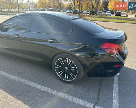 Черный БМВ 6 Серия, объемом двигателя 2.98 л и пробегом 170 тыс. км за 17000 $, фото 4 на Automoto.ua
