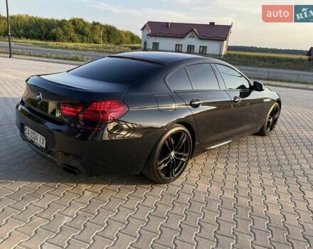 Черный БМВ 6 Серия, объемом двигателя 4.4 л и пробегом 147 тыс. км за 29500 $, фото 62 на Automoto.ua