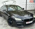 Чорний БМВ 6 Серія, об'ємом двигуна 3 л та пробігом 130 тис. км за 19000 $, фото 1 на Automoto.ua