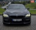 Черный БМВ 6 Серия, объемом двигателя 4.4 л и пробегом 147 тыс. км за 27999 $, фото 1 на Automoto.ua