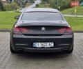 Черный БМВ 6 Серия, объемом двигателя 4.4 л и пробегом 147 тыс. км за 27999 $, фото 1 на Automoto.ua