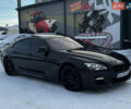 Черный БМВ 6 Серия, объемом двигателя 4.4 л и пробегом 122 тыс. км за 29999 $, фото 1 на Automoto.ua