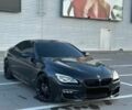 Черный БМВ 6 Серия, объемом двигателя 2.98 л и пробегом 170 тыс. км за 25000 $, фото 1 на Automoto.ua