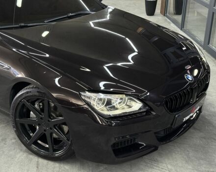 Черный БМВ 6 Серия, объемом двигателя 4.4 л и пробегом 53 тыс. км за 24000 $, фото 1 на Automoto.ua