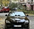 Черный БМВ 6 Серия, объемом двигателя 3 л и пробегом 185 тыс. км за 23000 $, фото 1 на Automoto.ua