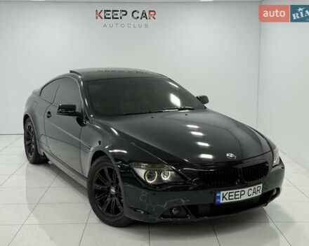 Черный БМВ 6 Серия, объемом двигателя 4.4 л и пробегом 130 тыс. км за 11000 $, фото 1 на Automoto.ua