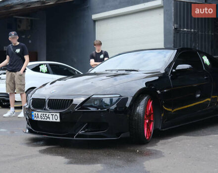 Черный БМВ 6 Серия, объемом двигателя 4.4 л и пробегом 150 тыс. км за 19500 $, фото 1 на Automoto.ua