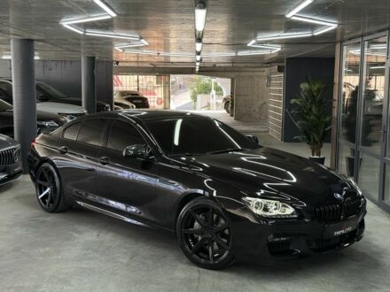 Черный БМВ 6 Серия, объемом двигателя 4.4 л и пробегом 53 тыс. км за 24000 $, фото 1 на Automoto.ua