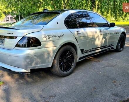 Белый БМВ 7 Серия, объемом двигателя 2.99 л и пробегом 330 тыс. км за 9700 $, фото 10 на Automoto.ua