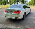 Белый БМВ 7 Серия, объемом двигателя 4.4 л и пробегом 200 тыс. км за 12500 $, фото 1 на Automoto.ua