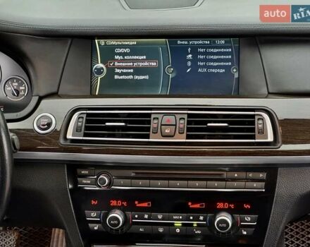 Білий БМВ 7 Серія, об'ємом двигуна 3 л та пробігом 133 тис. км за 12500 $, фото 45 на Automoto.ua
