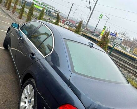 Белый БМВ 7 Серия, объемом двигателя 3 л и пробегом 375 тыс. км за 5000 $, фото 1 на Automoto.ua