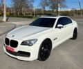 Белый БМВ 7 Серия, объемом двигателя 3 л и пробегом 129 тыс. км за 22500 $, фото 1 на Automoto.ua