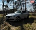 Білий БМВ 7 Серія, об'ємом двигуна 3 л та пробігом 165 тис. км за 23900 $, фото 1 на Automoto.ua