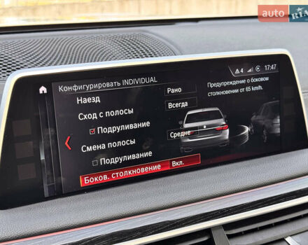 Белый БМВ 7 Серия, объемом двигателя 3 л и пробегом 159 тыс. км за 32000 $, фото 27 на Automoto.ua