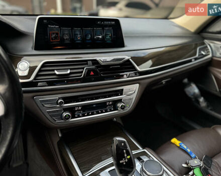 Белый БМВ 7 Серия, объемом двигателя 2.99 л и пробегом 124 тыс. км за 45000 $, фото 30 на Automoto.ua