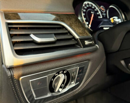 Белый БМВ 7 Серия, объемом двигателя 4.4 л и пробегом 126 тыс. км за 27777 $, фото 24 на Automoto.ua