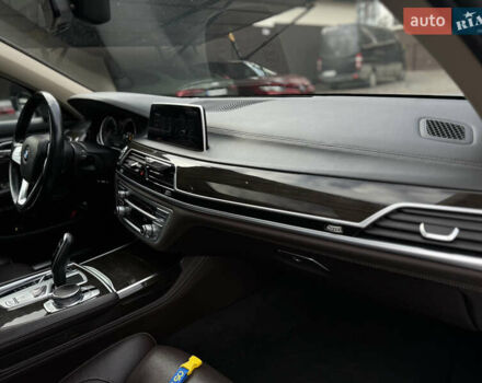 Белый БМВ 7 Серия, объемом двигателя 2.99 л и пробегом 124 тыс. км за 45000 $, фото 13 на Automoto.ua