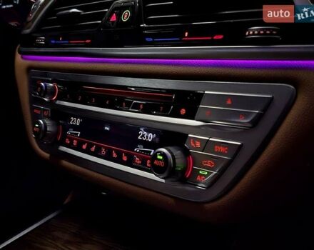 Белый БМВ 7 Серия, объемом двигателя 3 л и пробегом 161 тыс. км за 29979 $, фото 35 на Automoto.ua